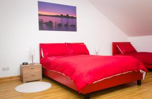 A bed or beds in a room at Abateg Self Catering 