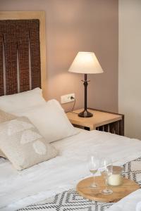 Postel nebo postele na pokoji v ubytování Vranas Ambiance Hotel