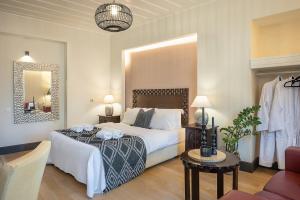 Postel nebo postele na pokoji v ubytování Vranas Ambiance Hotel