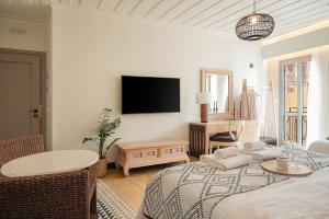 Postel nebo postele na pokoji v ubytování Vranas Ambiance Hotel