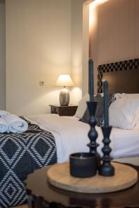 Postel nebo postele na pokoji v ubytování Vranas Ambiance Hotel