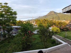 Afbeelding uit fotogalerij van Kalia Cottage in Batu