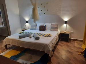 Postel nebo postele na pokoji v ubytování Tandif Villa Sea View