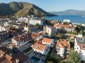 an aerial view of a city with houses and the water at Villa Tutar 1 Marmaris Daily Weekly Rentals in Muğla
