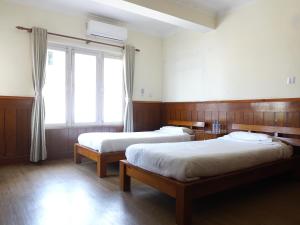Katil atau katil-katil dalam bilik di Hotel Suva