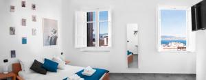 TV a/nebo společenská místnost v ubytování B&B Fuori Squadro - In Centro con Terrazza Relax vista Mare
