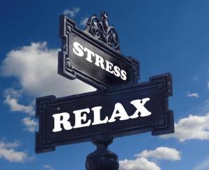 a sign that says stress relax on a street sign at Channel Centrum Deptak PKP PKS -zameldowanie -wymeldowanie bez kontaktowe in Kielce