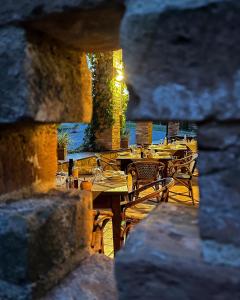 a group of tables and chairs on a patio at Antica Torre in Salsomaggiore Terme