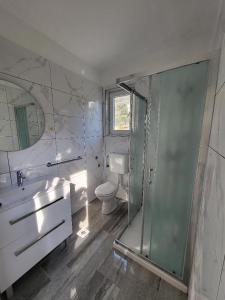Koupelna v ubytování Apartmani Mira