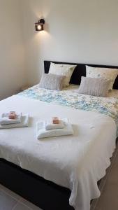 Un pat sau paturi într-o cameră la Villa KPS