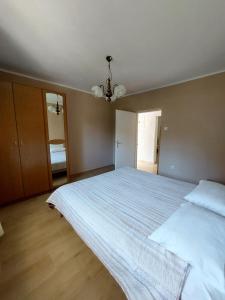 Postel nebo postele na pokoji v ubytování Appartamenti Clara