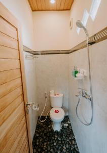 Ванная комната в BALINESE HOUSE UBUD