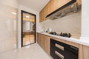 Una cocina o zona de cocina en 岗厦汇花园行政公寓酒店-深圳福田会展中心岗厦地铁站店