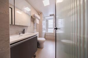 Un baño de 岗厦汇花园行政公寓酒店-深圳福田会展中心岗厦地铁站店