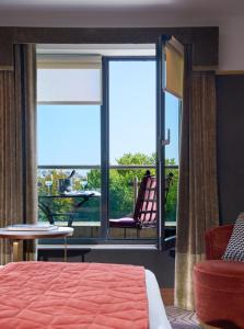 Letto o letti in una camera di The Fitzwilliam Hotel