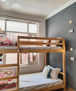 Postel nebo postele na pokoji v ubytování Be Happy HomeStay + 41 fotografií