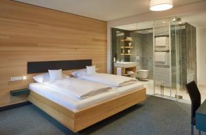 Postel nebo postele na pokoji v ubytování ElzLand Hotel 9 Linden