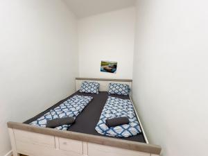 En eller flere senger på et rom på Family Apartment KL38
