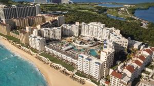 an aerial view of a resort on the beach at Hilton Cancun Mar Caribe All-Inclusive Resort in Cancún