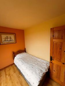 Postel nebo postele na pokoji v ubytování Clare Homestay