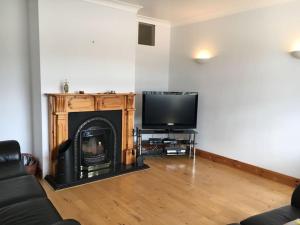 TV a/nebo společenská místnost v ubytování Clare Homestay