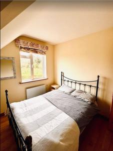Postel nebo postele na pokoji v ubytování Clare Homestay