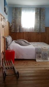 A bed or beds in a room at La Stella delle Alpi