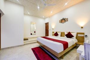 A bed or beds in a room at Hotel Shiva Lake Mussoorie - 360 Degree View - Free Parking