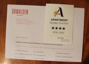 un permiso blanco para un participante en un concierto de vacaciones en Wohnung Bemer-Rempfler - b48555, en Lungern