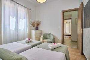 Postel nebo postele na pokoji v ubytování Olivia Mare Vacation House Corfu