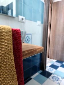 Postel nebo postele na pokoji v ubytování La casa dei 4 venti Alloggio Turistico