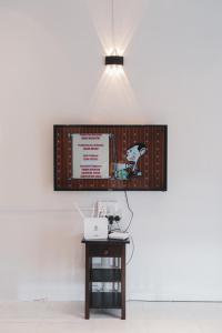 TV a/nebo společenská místnost v ubytování 居銮小云顶名宿KLUANG SMALL GENTING HOMESTAY
