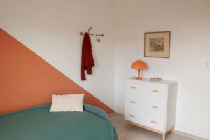 Postel nebo postele na pokoji v ubytování Duplex 6 personnes, vue panoramique sur lac