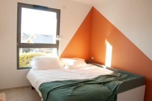 Postel nebo postele na pokoji v ubytování Duplex 6 personnes, vue panoramique sur lac