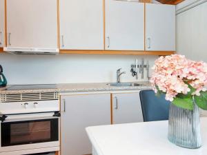 Kuchyň nebo kuchyňský kout v ubytování Holiday home Aabenraa LX