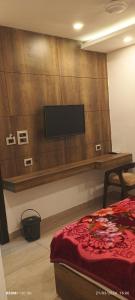 TV i/ili zabavni centar u objektu Hotel Ganges Pride