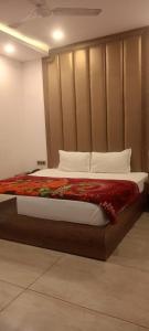 Krevet ili kreveti u jedinici u objektu Hotel Ganges Pride