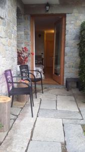 A patio or other outdoor area at La Stella delle Alpi