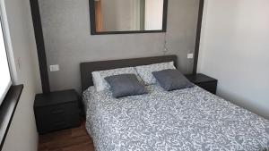 Postel nebo postele na pokoji v ubytování FabysHouse Appartamento in Villa
