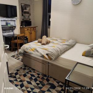 Postel nebo postele na pokoji v ubytování St Lucia Leicester