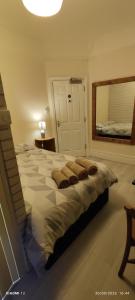 Postel nebo postele na pokoji v ubytování St Lucia Leicester