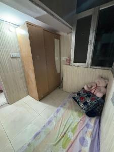 Tempat tidur dalam kamar di Chandigarh Housing Board Flats Sector 44 D