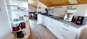 Virtuvė arba virtuvėlė apgyvendinimo įstaigoje Sonnen-Juwel mit Pool - Sauna direkt an der Skipiste