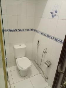Een badkamer bij Apartamento aconchegante