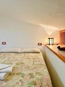 Ένα ή περισσότερα κρεβάτια σε δωμάτιο στο Villa Maga