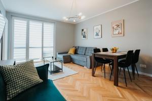 Connecta - Apartament w centrum tesisinde bir oturma alanı