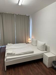 Postel nebo postele na pokoji v ubytování Potsdamer Inn