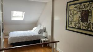 En eller flere senge i et værelse på Villa, centre-ville, Paris, Disneyland, Ascenseur, Parkings