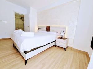 Posteľ alebo postele v izbe v ubytovaní Apartamento Puerto Sol y Mar