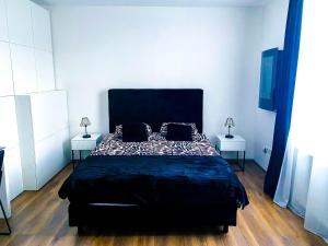 Posteľ alebo postele v izbe v ubytovaní Octagon Main Square Apartment
